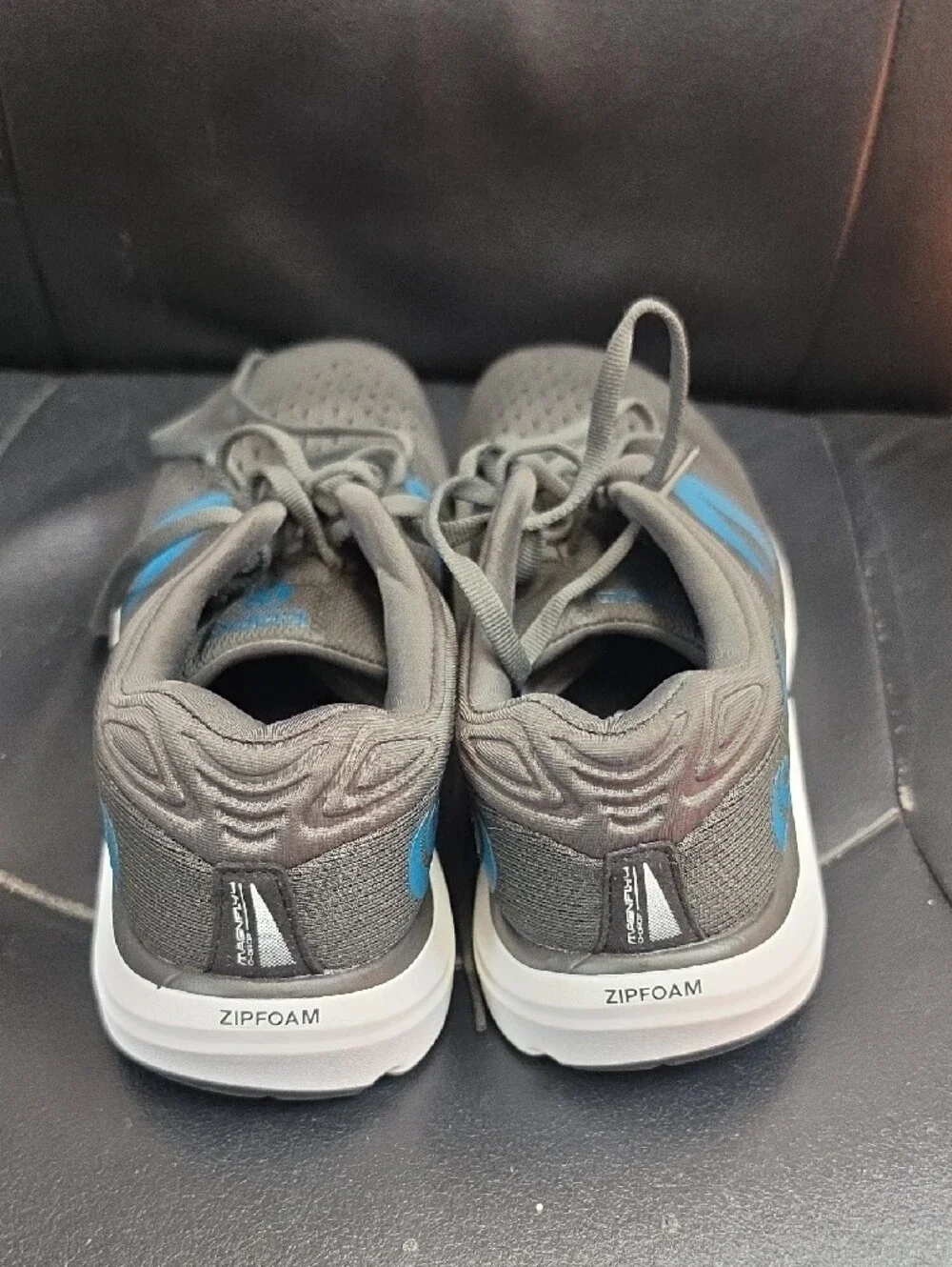 Men's Grey Athletic Running Shoes with Blue Accents